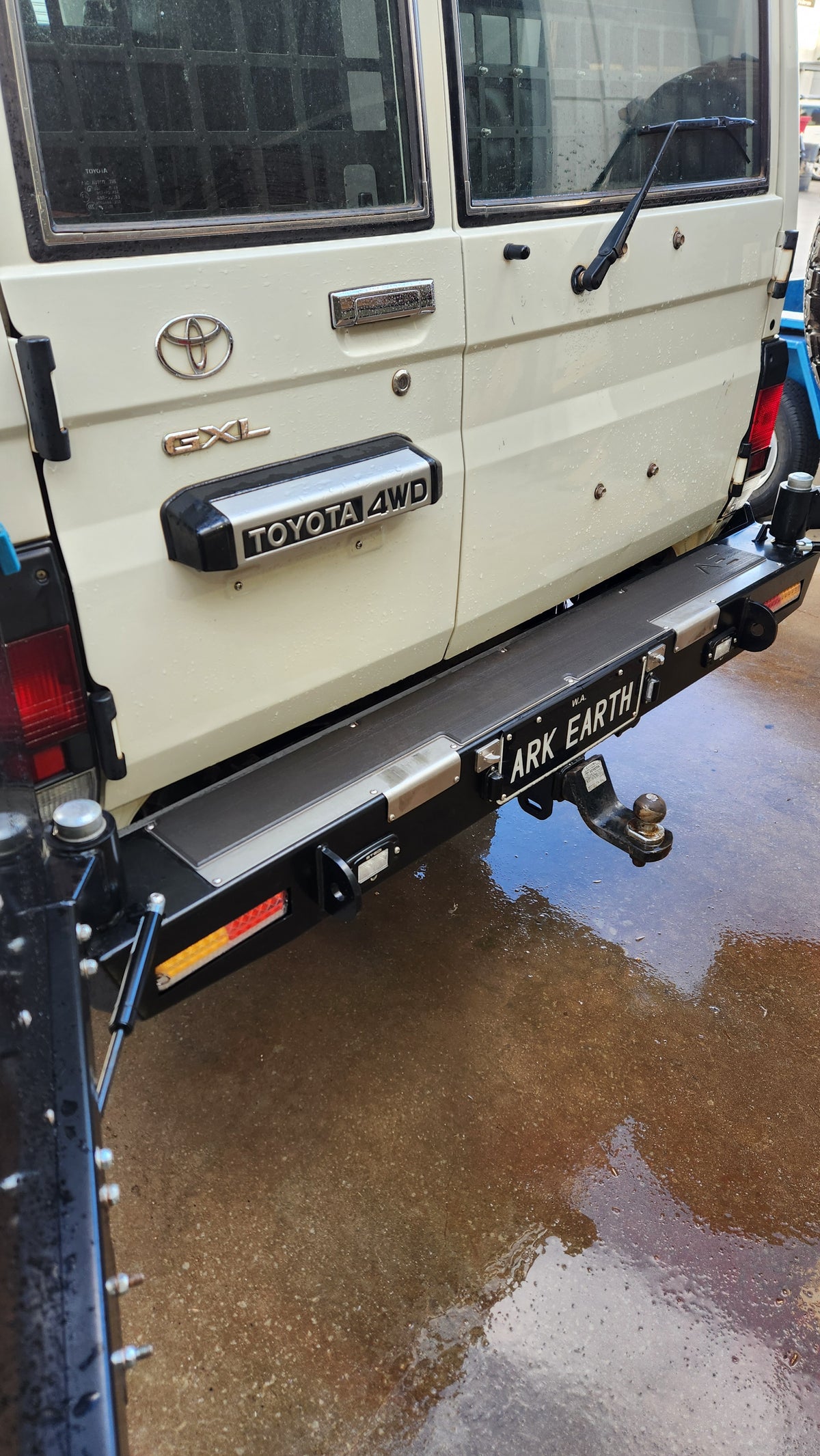 EVA foam step fitted to the stainless steel top of an Ark Earth Troopcarrier rear bar